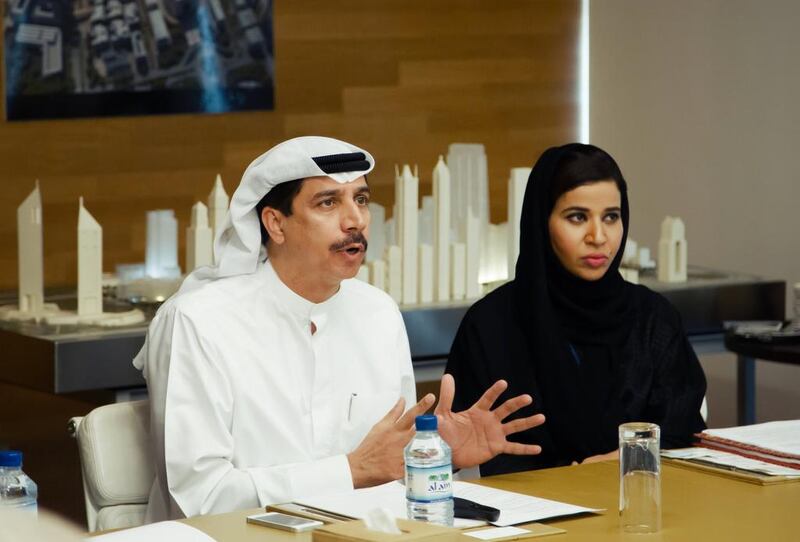 Essa Kazim, governor and executive chairman of the DIFC, left, during the company's review for the half-year operating review yesterday, September 21, 2014. Rebecca Rees for The National