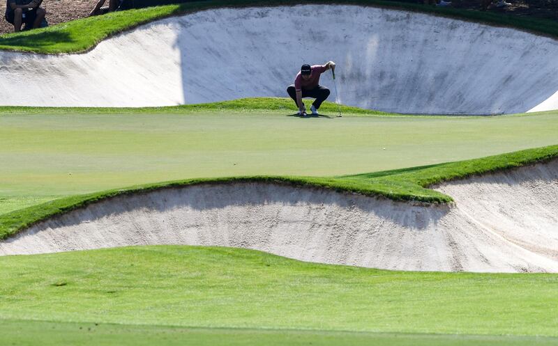 Justin Rose ponders a shot during the DP World Tour Championship at Jumeirah Golf Estates in Dubai. AFP