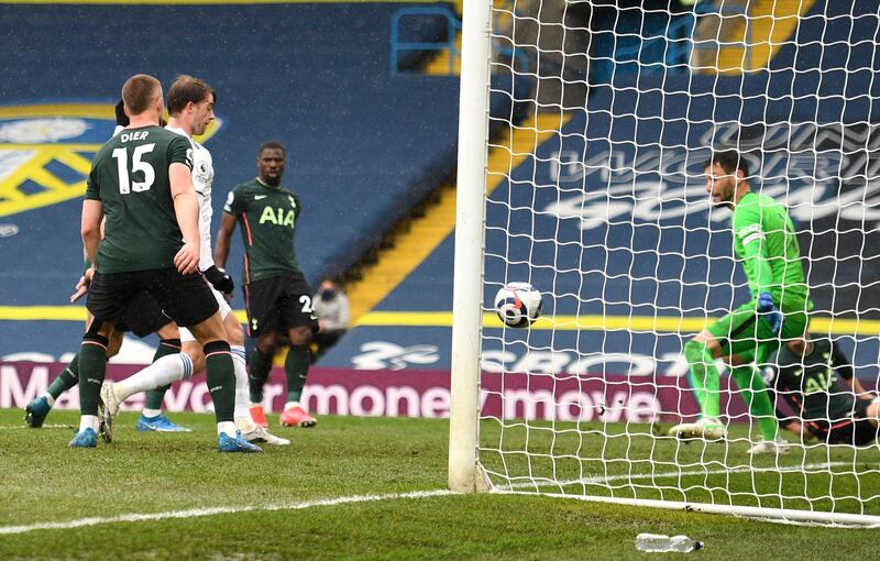 Patrick Bamford, partially hidden, scores for Leeds. AP