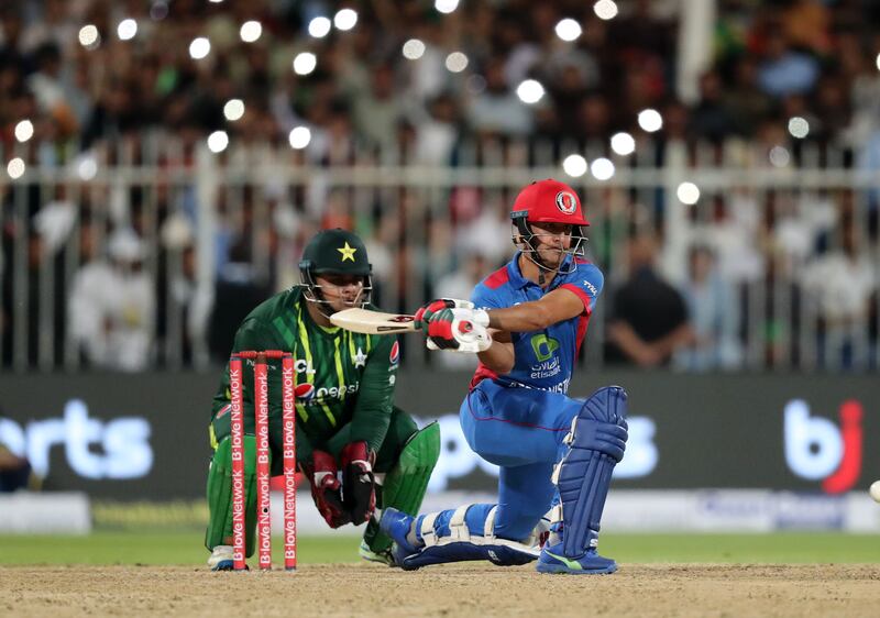 Afghanistan's Najibullah Zadran hits out at the T20 series at the Sharjah Cricket Stadium in the UAE. Chris Whiteoak / The National