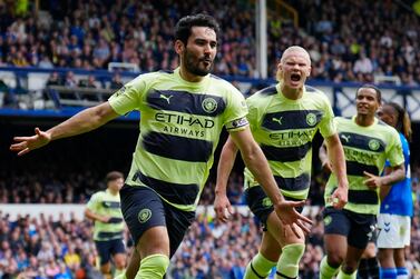 Manchester City's Ilkay Gundogan celebrates after scoring his side's opening goal during the English Premier League soccer match between Everton and Manchester City at the Goodison Park stadium in Liverpool, England, Sunday, May 14, 2023.  (AP Photo / Jon Super)
