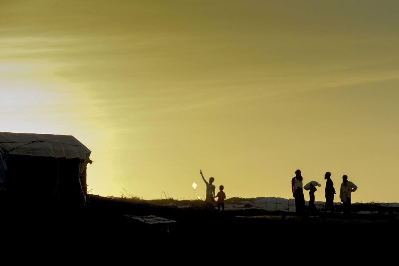 A Rohingya boy flies a kite at Hakimpara refugee camp. Munir uz Zaman / AFP Photo