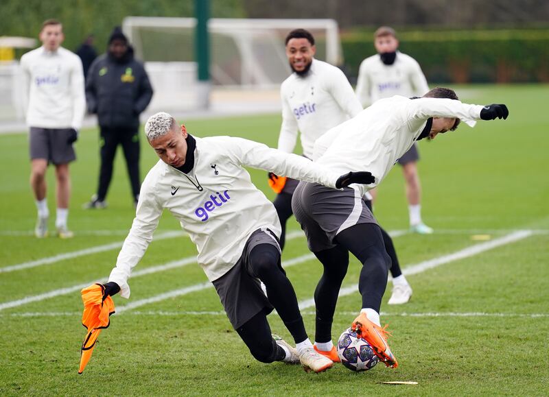 Tottenham Hotspur's Richarlison trips over during a training session. PA