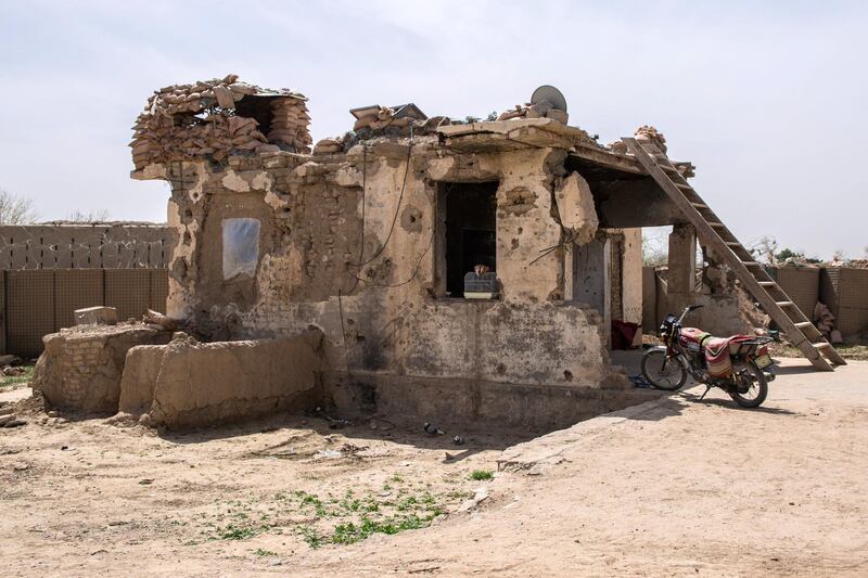 Once a classroom, now the police dormitory at Assad Suri Primary School in Kandahar's Zhari District. Many of the buildings have been destroyed in airstrikes and by blasts. 