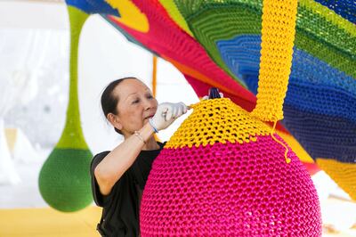 DUBAI, UNITED ARAB EMIRATES - AUG 3: 

77 year old Japanese artist, Toshiko Horiuchi MacAdam, weaves the nets at a new play area in Dubai called OliOli.

Toshiko creates nets made out of 800-1,000 kilos of nylon and weaves them into beautiful and inspiring art installations that are entirely interactive. 


(Photo by Reem Mohammed/The National)

Reporter: Hala Khalaf
Section: AC