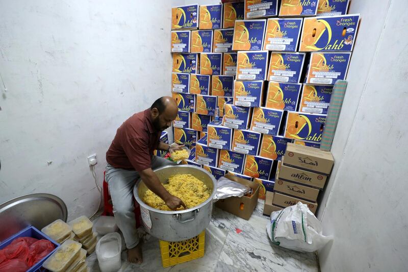 Dubai, United Arab Emirates - May 16, 2019: People prepare for Iftar. Mosque series for Ramdan. Lootah Masjid Mosque is an old mosque in Deira. Thursday the 16th of May 2019. Deira, Dubai. Chris Whiteoak / The National