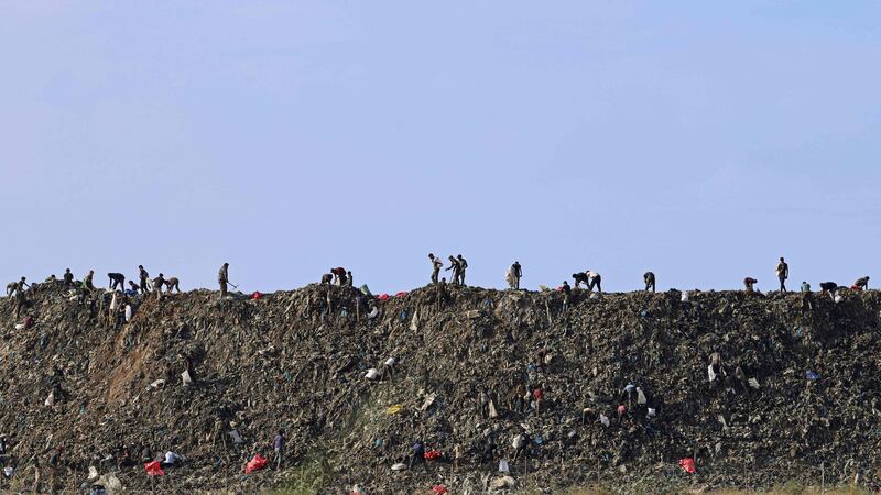 Workers sort out rubbish at the landfill of Burj Hammoud, north of Beirut. AFP
