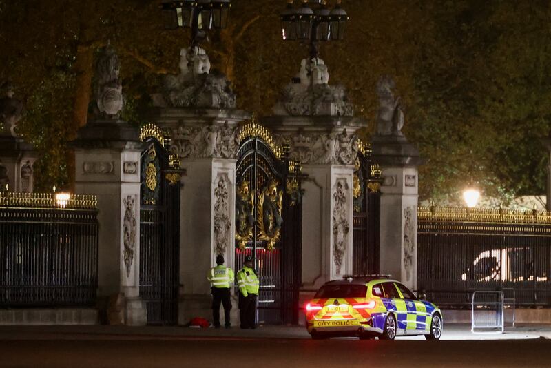 Police at the gates of Buckingham Palace after a man was arrested on Tuesday evening. Reuters