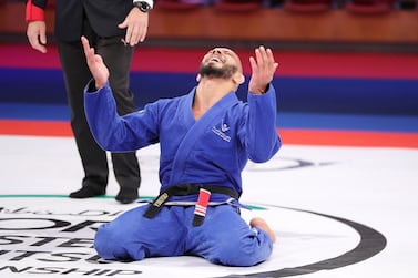 Adriano Araujo (from BRA in Blue) won the final of 77 kg black belt category against Jacob Mackenzie (from CAN in Red) in the World Professional Jiu-Jitsu championship held at Zayed Sports City’s Jiu-Jitsu Arena in Abu Dhabi on 16th November, 2021. Pawan Singh/The National. Story by Amith