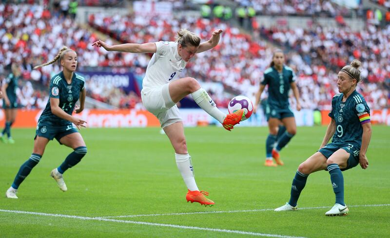 England's Ellen White controls the ball. PA