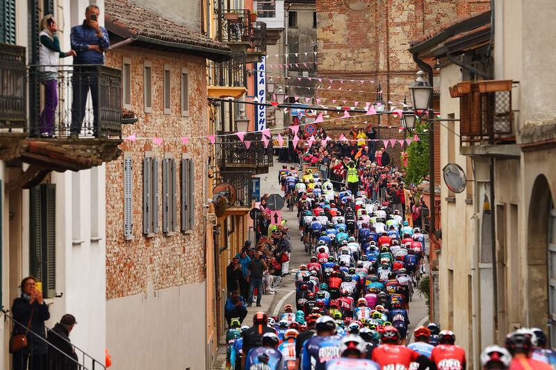 The peloton rides through the village of Lu, near Alessandria, during Stage 3. AFP