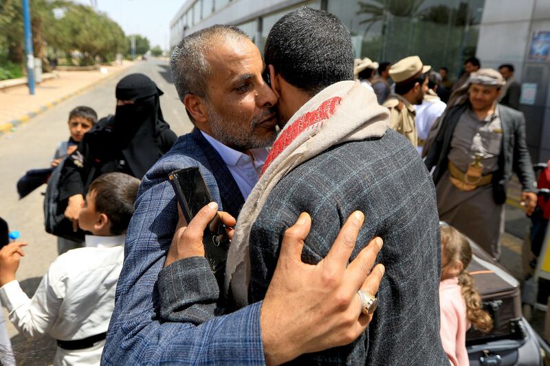 Yemeni pilgrims wish loved ones well as they prepare to board a flight from Sanaa airport to Makkah to perform the Hajj pilgrimage. AFP