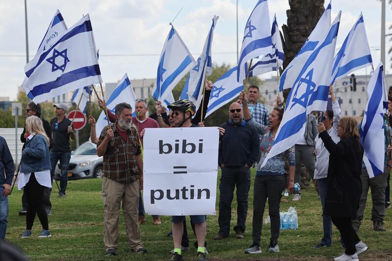 Israelis protesting against the government's judicial reform bill at one of the entrances of Ben Gurion Airport near Tel Aviv.  AFP