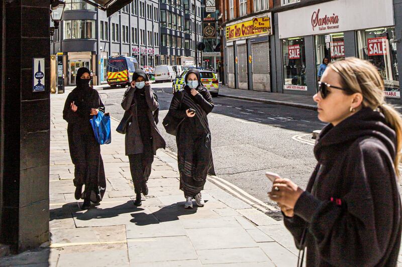 London and its reaction to wearing masks during the Covid-19 pandemic. Photographed for The National UAE