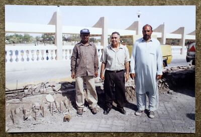 A cherished photograph of Muneefa Al Khatib’s late husband, Adnan. (centre).  Pawan Singh / The National