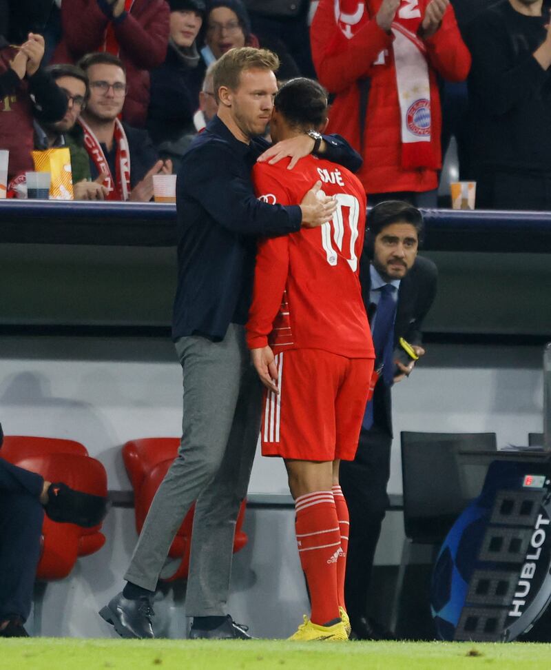 Bayern Munich's Leroy Sane with coach Julian Nagelsmann after he was substituted. Reuters