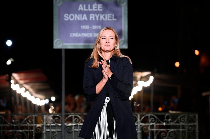 Fashion designer Julie de Libran for Sonia Rykiel acknowledges the audience at the end of the Sonia Rykiel Spring-Summer 2019 Ready-to-Wear collection fashion show in Paris. AFP