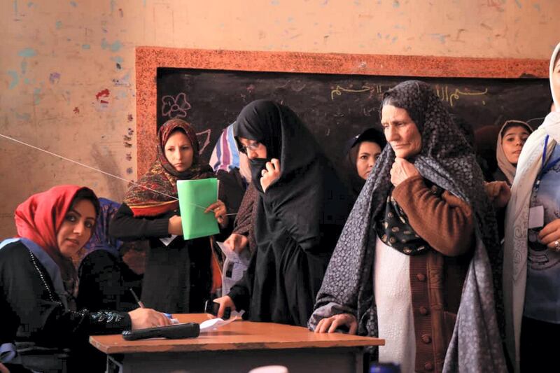 Women line up to vote in Herat  Shafi Amini/The National