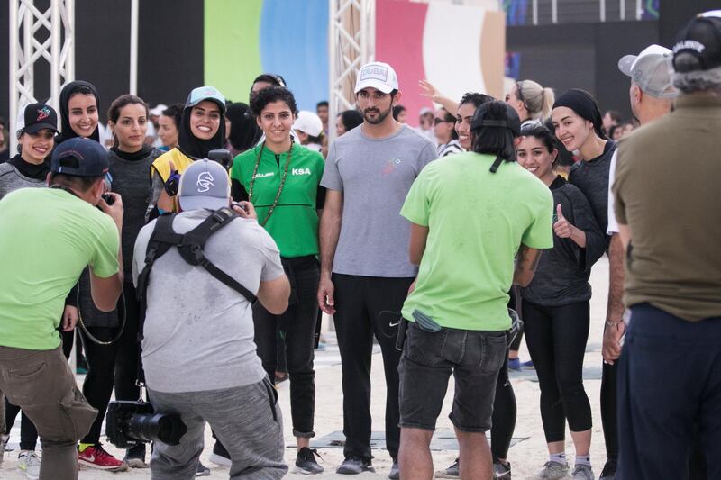 DUBAI, UNITED ARAB EMIRATES - April 3 2019.

Sheikh Hamdan bin Mohammed bin Rashid Al Maktoum with F3 women's team at day one of Dubai Gov Games.

 (Photo by Reem Mohammed/The National)

Reporter: 
Section:  NA
