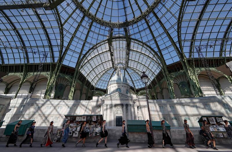 Models present creations from the Fall/Winter 2018/19 Haute Couture collection by German designer Karl Lagerfeld for Chanel during the Paris Fashion Week, in Paris, France. Ian Langsdon / EPA