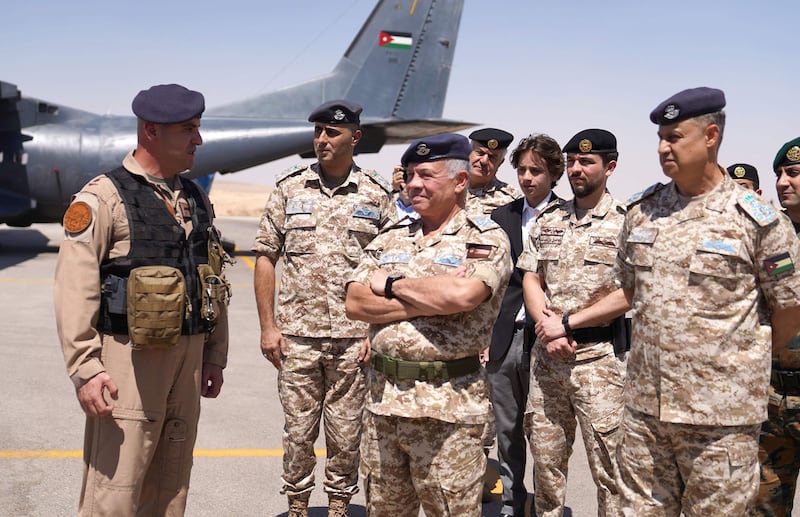 Jordan's King Abdullah (centre), at an airbase in Jordan on July 24, 2022. AFP