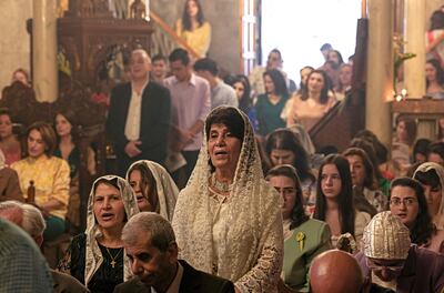 Palestinian Orthodox attend the Palm Sunday mass at a church in Gaza City on Sunday. AFP