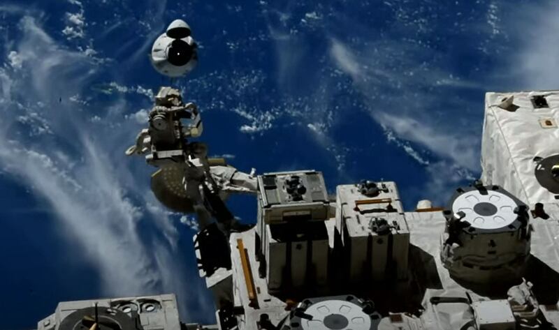 The SpaceX Dragon capsule begins its return to Earth. AFP