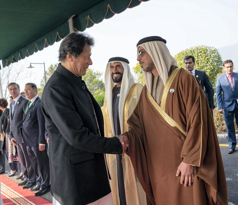 ISLAMABAD, PAKISTAN - January 06, 2019: HH Sheikh Mansour bin Zayed Al Nahyan, UAE Deputy Prime Minister and Minister of Presidential Affairs (R), greets HE Imran Khan, Prime Minister of Pakistan (L), at the Prime Minister's residence. Seen with HH Sheikh Nahyan Bin Zayed Al Nahyan, Chairman of the Board of Trustees of Zayed bin Sultan Al Nahyan Charitable and Humanitarian Foundation (2nd R).

(  Mohammed Al Hammadi / Ministry of Presidential Affairs )
---