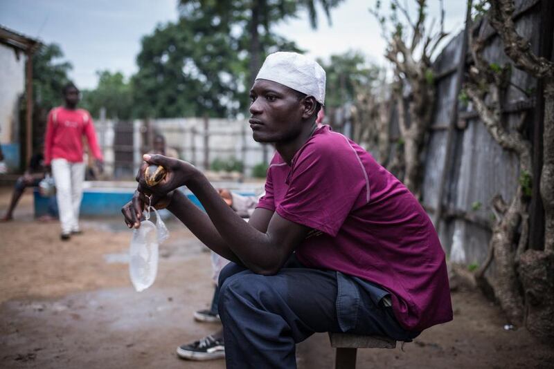 A Congolese Muslim waits for dusk to break the fast on the second day of Ramadan, in the mosque of Zongo on June 19, 2015. About 1500 Central African Republic (CAR) refugees live in this congolese city of Zongo, located near Bangui, after fleeing brutal inter-religious violence in 2013-2014. Federico Scoppa / AFP photo