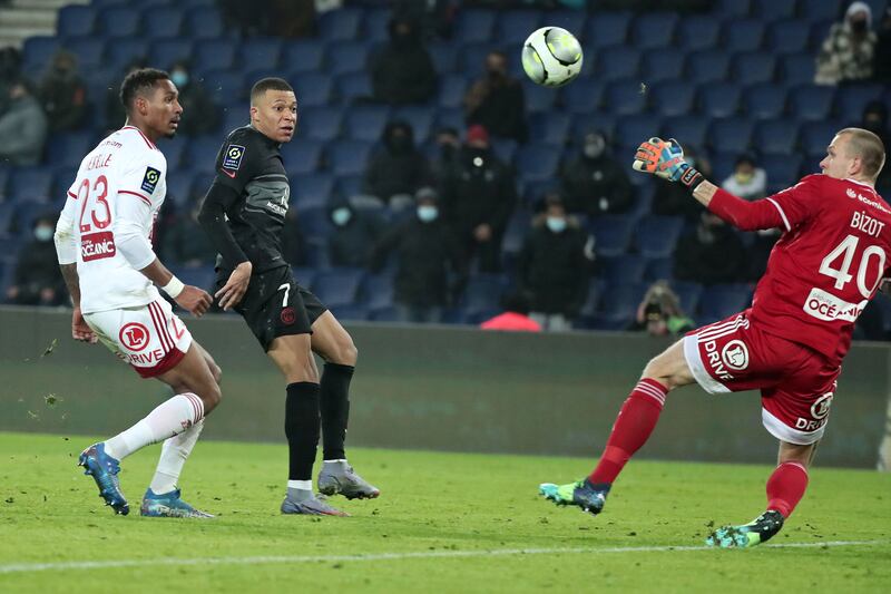 Paris Saint-Germain's Kylian Mbappe in action against Brest goalkeeper Marco Bizo. EPA