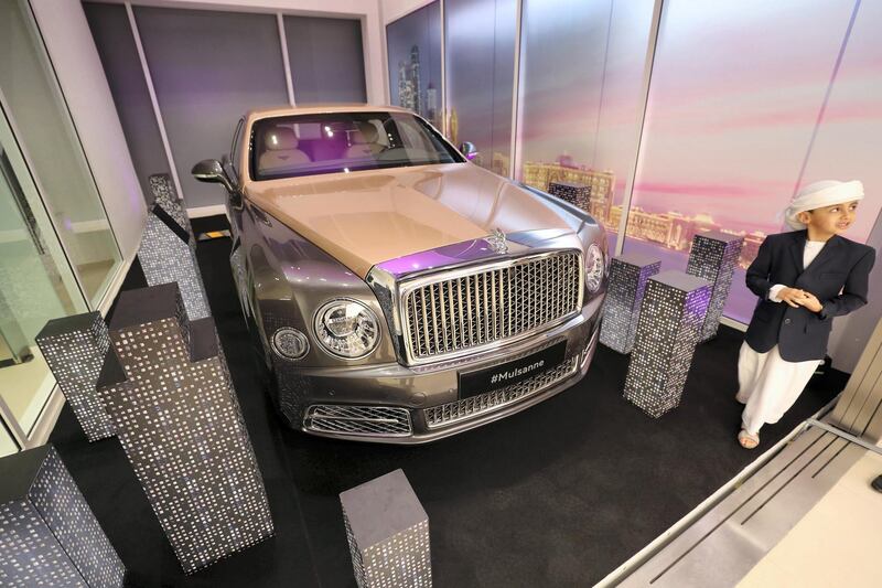 Abu Dhabi, United Arab Emirates - Reporter: Simon Wilgress-Pipe: Saeed aged 5 with a Bentley Mulsanne. The opening of the new Bentley Emirates showroom. Tuesday, January 21st, 2020. Abu Dhabi. Chris Whiteoak / The National