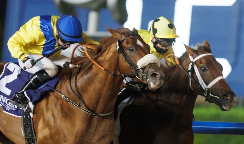 Tadhg O’Shea on board Kafoo (near side) riding the first of his three winners at Meydan on Thursday, December 16, 2021. DHRIC