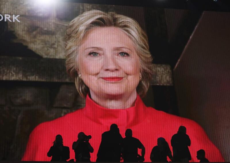 Democratic presidential nominee Hillary Clinton appears live via satellite to address the convention. Andrew Gombert / EPA