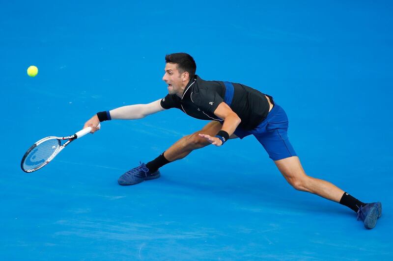 Novak Djokovic of Serbia stretches to return the ball during his third round match against Albert Ramos-Vinolas. Scott Barbour / Getty Images