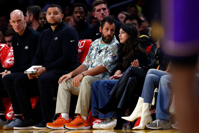 Actor Adam Sandler watches the NBA game between Atlanta Hawks and Los Angeles Lakers in California on Friday, January 6, 2023. AFP