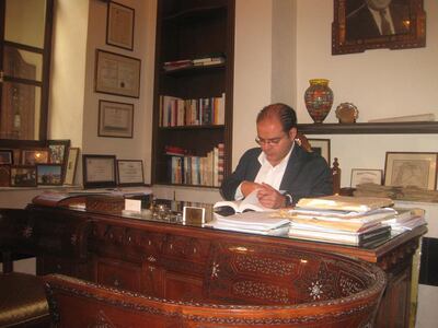 The Syrian writer and historian Sami Moubayed seated in his office. Courtesy of Maysoon Barber