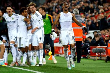 Leeds United's Crysencio Summerville celebrates scoring their side's second goal of the game during the English Premier League soccer match between Liverpool and Leeds United at Anfield in Liverpool, England, on Saturday, Oct.  29, 2022.  (Richard Sellers / PA via AP)