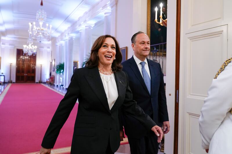 Vice President Kamala Harris and her husband Douglas Emhoff arrive for a ceremony to award the nation's highest civilian honour, the Presidential Medal of Freedom. AP