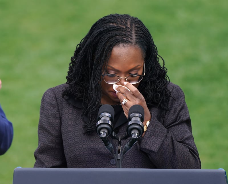 Ms Jackson wipes a tear as she speaks to celebrate her confirmation on the South Lawn of the White House in Washington. EPA