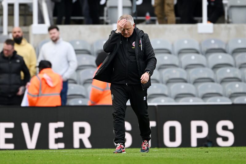 Chris Wilder, manager of Sheffield United, looks dejected after the team's defeat, which confirms Sheffield United's relegation from the Premier League. Getty Images