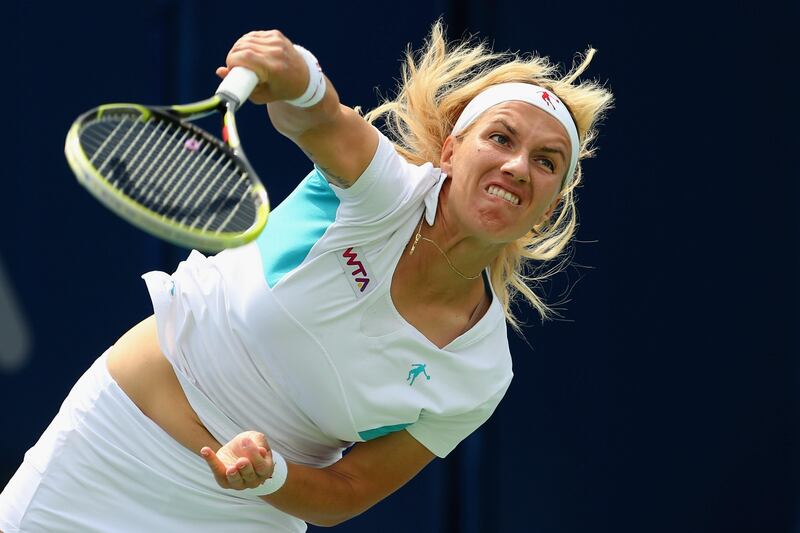 DUBAI, UNITED ARAB EMIRATES - FEBRUARY 18:  Svetlana Kuznetsova of Russia serves in her match against Anabel Medina Garrigues of Spain during day one of the WTA Dubai Duty Free Tennis Championship on February 18, 2013 in Dubai, United Arab Emirates.  (Photo by Julian Finney/Getty Images) *** Local Caption ***  161945326.jpg