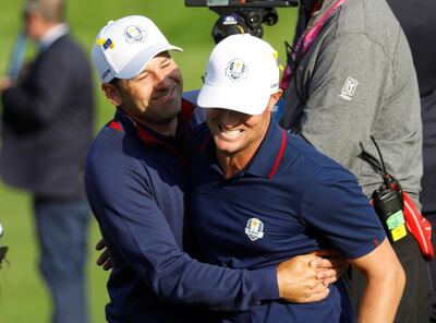 Golf - 2018 Ryder Cup at Le Golf National - Guyancourt, France - September 28, 2018  Team Europe's Sergio Garcia and Alex Noren celebrate after winning their Foursomes match against Team USA's Phil Mickelson and Bryson DeChambeau  REUTERS/Charles Platiau