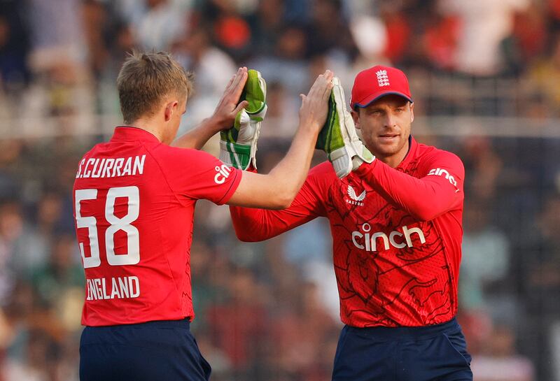 England bowler Sam Curran celebrates with Jos Buttler after taking the wicket of Bangladesh's Litton Das for nine. Reuters