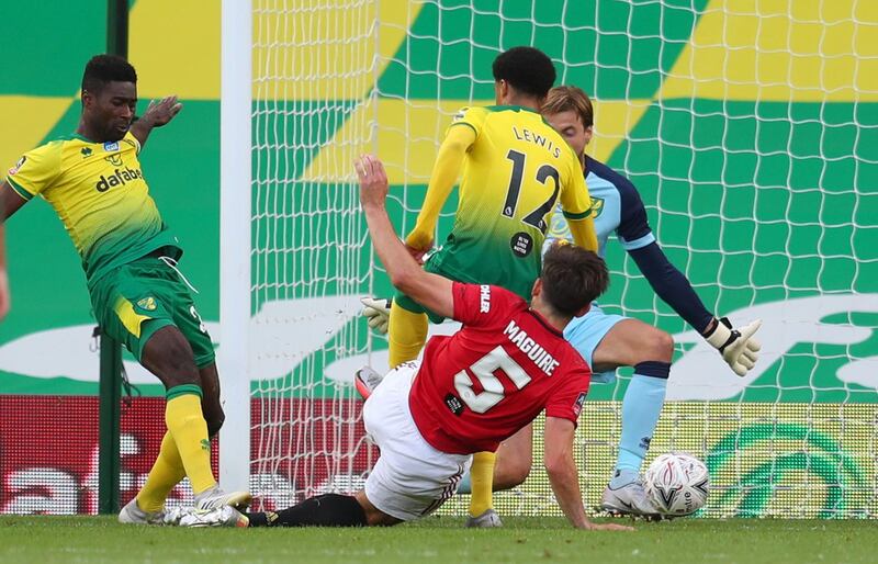 Soccer Football -  FA Cup - Quarter Final - Norwich City v Manchester United - Carrow Road, Norwich, Britain - June 27, 2020 Manchester United's Harry Maguire scores their second goal, as play resumes behind closed doors following the outbreak of the coronavirus disease (COVID-19)  Catherine Ivill/Pool via REUTERS