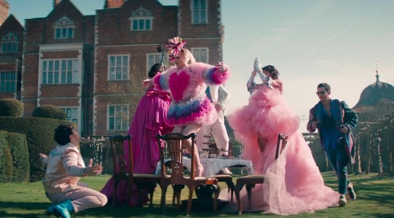 The Jonas Brothers' 'Sucker' video stars the three brothers and their partners. The video was filmed in England.