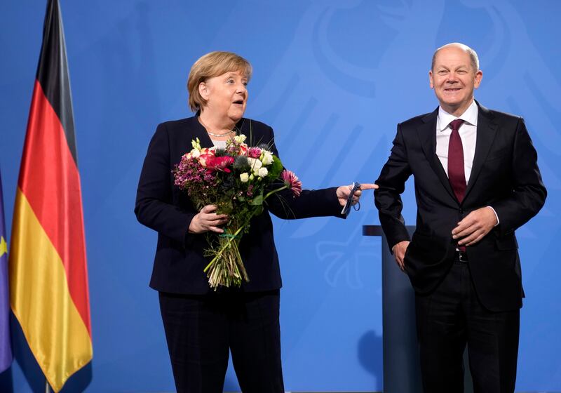 Germany's assessment of Nord Stream 2 was written when Angela Merkel was chancellor and Olaf Scholz was finance minister. AP