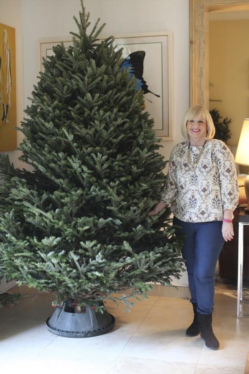 Suzanne Jackson buys a fresh Christmas tree each year as a holiday tradition. Lee Hoagland / The National