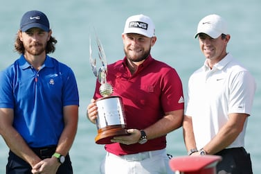 ABU DHABI, UNITED ARAB EMIRATES - JANUARY 18: Tommy Fleetwood of England, Tyrrell Hatton of England and Rory McIlroy of Northern Ireland pose for a photo prior to the Abu Dhabi HSBC Championship at Yas Links Golf Course on January 18, 2022 in Abu Dhabi, United Arab Emirates. (Photo by Oisin Keniry / Getty Images)