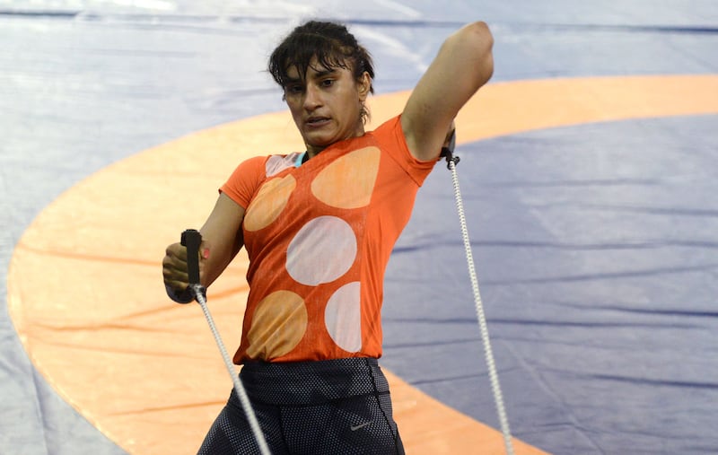 Indian wrestler Vinesh Phogat has been temporarily suspended for "indiscipline" at the Olympics.
