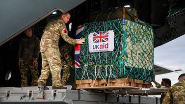A Royal Air Force member loads humanitarian aid on to a A400M aircraft  to be dropped along the northern coastline of Gaza, on March 26.  RAF / UK MoD / Reuters